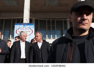 CHISINAU, MOLDOVA/JANUARY 13, 2016: Vladimir Plahotniuc(middle), Chairman Of The Democratic Party Of Moldova Behind Bodyguard.