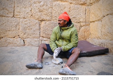 Chitradurga, Karnataka, India - 30 Jan 2022: A selective focus of face of the famous Indian wall climber named Jyoti Raj, also known as Kothi Raj(Raju or Raja). The right hand is blurred due to motion