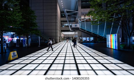 CHIYODA, TOKYO, JAPAN - MAY 23, 2019:  Night View Featuring One Of The Illuminated Entrance Paths From Tokyo International Forum. The Complex Was Designed By Architect Rafael Viñoly.