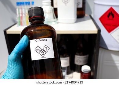 Chlorine In Bottle, Chemical In The Laboratory And Industry