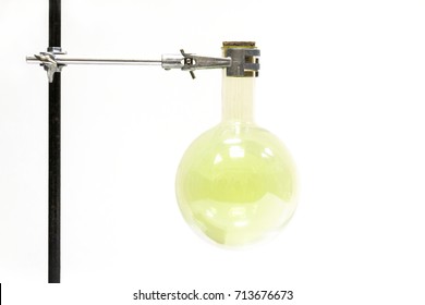 Chlorine Gaz In Round Bottom Glass Flask On A Lab Stand Rod