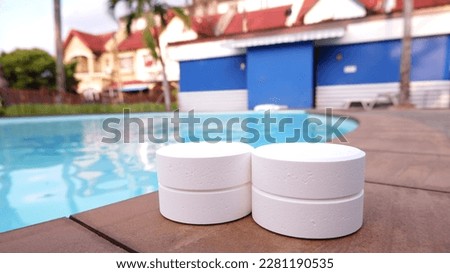 Chlorine tablets for swimming pools, chemicals for water maintenance in the pool.