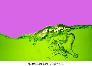 Chlorophyll Water Isolated On Pink Background.