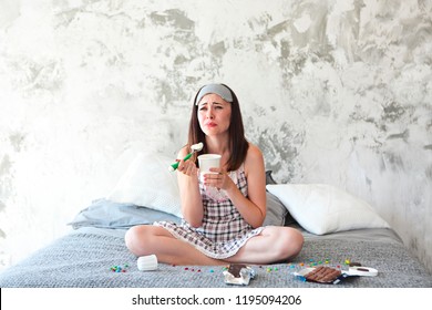 Chocoholic. Cheerful Sad Young Craing Woman Eating Sweets In Her Bedroom. Emotional Woman With Eating Icecream And Crying After Divorce. Stress Concept