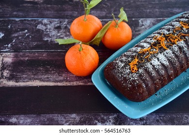 Chocolate Almond Clementine Cake Garnish With Powdered Sugar And Zest