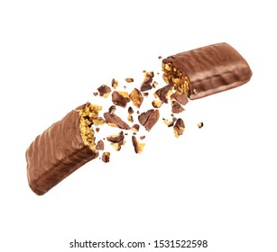 Chocolate bar with nougat is torn in the air on white background - Shutterstock ID 1531522598