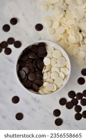 A chocolate beans. white, milk and dark chocolate. white background. delicious dessert - Shutterstock ID 2356558665