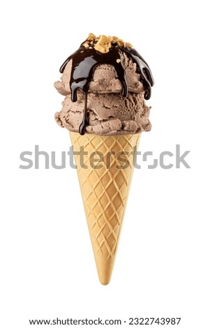 Chocolate brown ice cream scoop with chocolate sauce and nuts topping served on a crispy waffle cone isolated on white background.