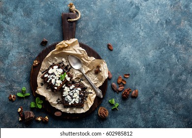 Chocolate Brownie Cake, Dessert With Nuts On Dark Background, Directly Above, Copy Space