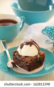 Chocolate Brownie Cake With A Scoop Of Ice Cream.