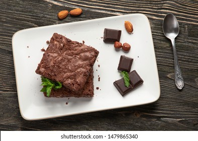 Chocolate Brownie Cake Served On Rectangle Plate. Top View 