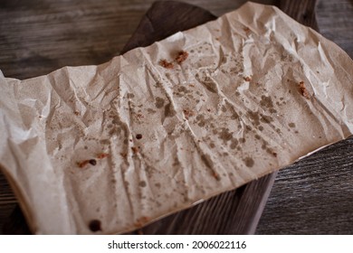 Chocolate Brownie Crumbs On Parchment