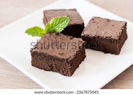 Similar – Schokoladenbrownie-Stücke auf Holz