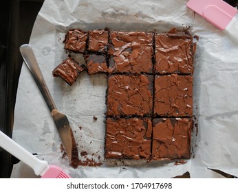 chocolate brownie, selective focus. Delicious fresh baked healthy vegan moist dark chocolate brownies dessert or sponge cake with coffee frosting cut in squares  - Shutterstock ID 1704917698