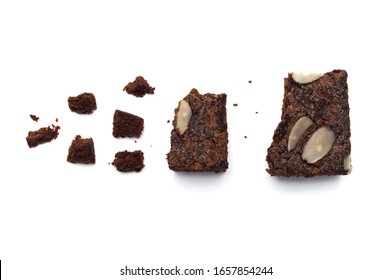 Chocolate Brownie With Sliced Almond Nuts Toppings Crumbs Isolated On White Background.