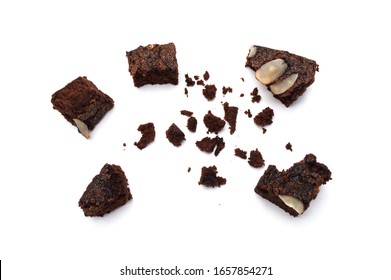 Chocolate Brownie With Sliced Almond Nuts Toppings Crumbs Isolated On White Background.