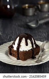 Chocolate Brownie Sundae With Vanilla Ice Cream And Hot Fudge Sauce