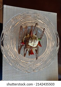 Chocolate Brownie Treat With Drizzle Of Chocolate Sauce In A Round Glass Bowl