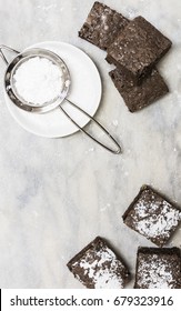 Chocolate Brownies Dusted With Icing Sugar,  Overhead View.