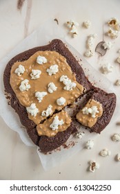 Chocolate Brownies With Peanut Butter Topping And Popcorn