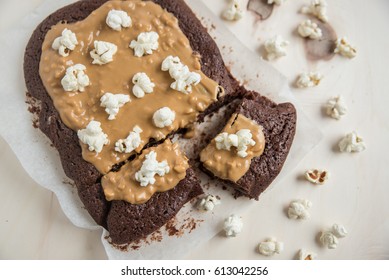 Chocolate Brownies With Peanut Butter Topping And Popcorn