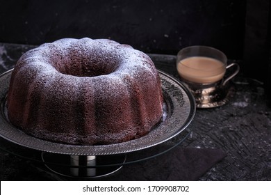 Chocolate Bundt Cake. Chocolate Bundt Cake with a rich thick glaze. - Powered by Shutterstock