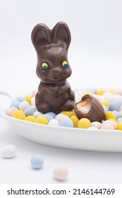 Chocolate Bunny With Cadbury Creme Egg On Top Of Candy Eggs

