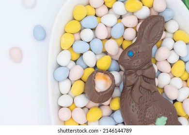 Chocolate Bunny With Cadbury Creme Egg On Top Of Candy Eggs