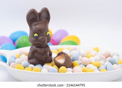 Chocolate Bunny With Cadbury Creme Egg On Top Of Candy Eggs

