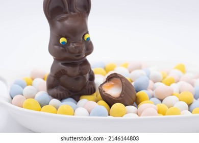 Chocolate Bunny With Cadbury Creme Egg On Top Of Candy Eggs

