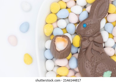 Chocolate Bunny With Cadbury Creme Egg On Top Of Candy Eggs