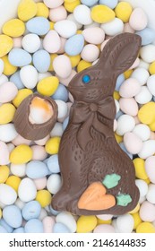 Chocolate Bunny With Cadbury Creme Egg On Top Of Candy Eggs