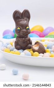 Chocolate Bunny With Cadbury Creme Egg On Top Of Candy Eggs

