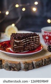 Chocolate Cacke On The Red Plate. Rustic Style. New Year And Christmas Concept