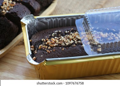 Chocolate Cake In Aluminum Foil Box Packaging.