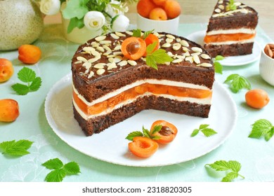 Chocolate cake with apricot jelly and almonds - Powered by Shutterstock