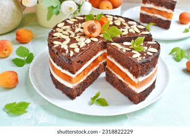 Chocolate cake with apricot jelly and almonds - Powered by Shutterstock