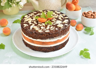 Chocolate cake with apricot jelly and almonds - Powered by Shutterstock