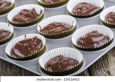 Chocolate Cake Batter In A Cupcake Case Before Baking