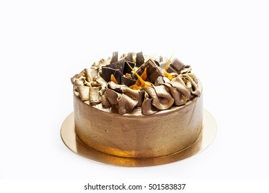 Chocolate Cake With Caramel And Nuts And Golden Glitter