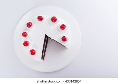 Chocolate Cake With Cherry On Top - White Background