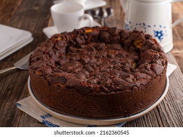 Chocolate Cake With Coffee On Wooden And Old-fashioned Table. Traditional German 