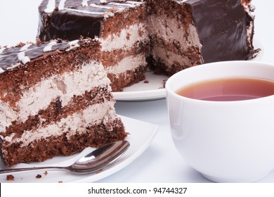 The Chocolate Cake And Cup Of Tea