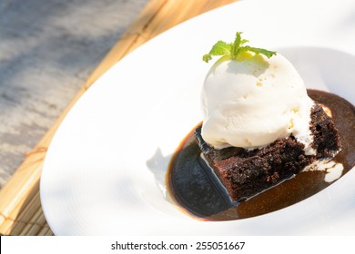 Chocolate Cake With Hot Fudge And Vanilla Ice Cream
