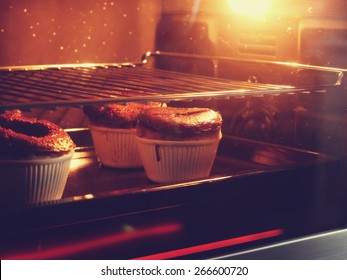 Chocolate Cake In Oven With Vintage Filter