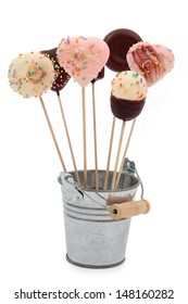 Chocolate Cake Pop In Metal Bucket Isolated On A White Background 