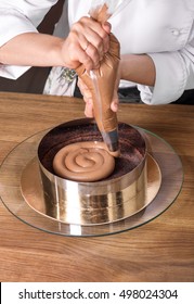 Chocolate Cake Preparing On Wooden Kitchen Table