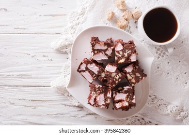 Chocolate Cake Rocky Road And Coffee On The Table. Horizontal View From Above
