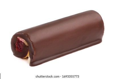 Chocolate cake roll with berry jam and butter cream isolated on white background - Shutterstock ID 1693355773