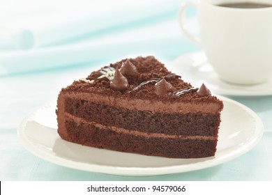 Chocolate Cake Slice On White Plate